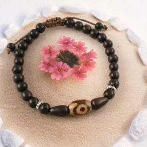 Armband mit Holzperlen und Dzi Perle Achat